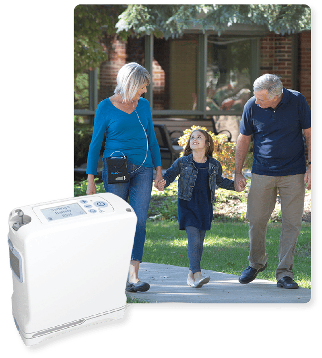 Oxygo FIT portable oxygen concentrator worn on family walk